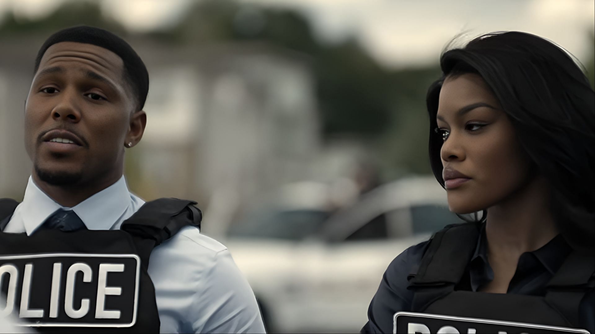 Detectives Grimes and Raymond arrive at the bank, initiating the tense police standoff. (Image via Netflix)
